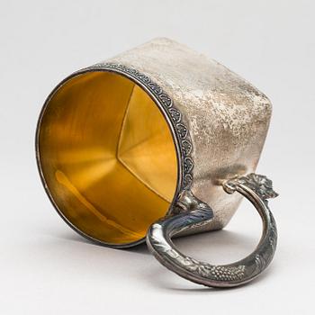 A parcel-gilt silver tea-glass holder, mark possibly of Vasily Andreyev, Moscow 1908-17.