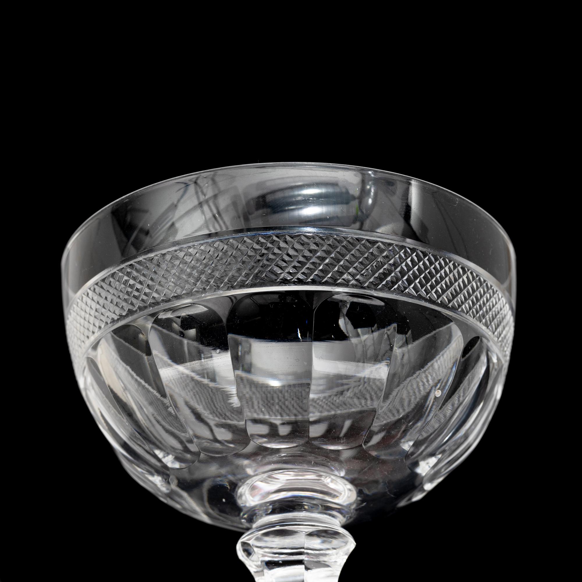 Elis Bergh, possibly, a 45-piece "Sparre" glass service, Kosta, Sweden.