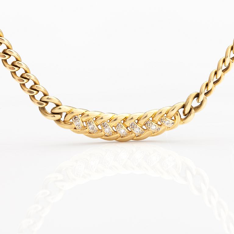 A 14K gold necklace with diamonds ca 0.035 ct in total.