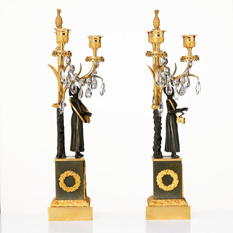 A pair of French  circa 1820-30th´s Empire candelabra.