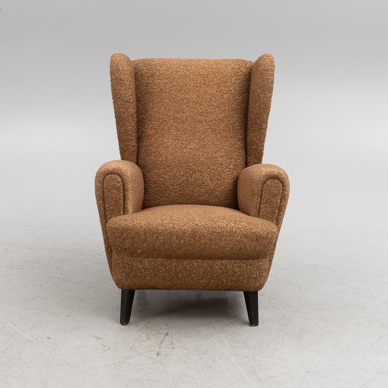 A wingback armchair, mid-20th Century.