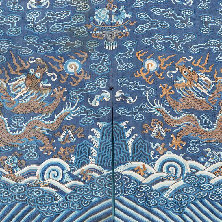 A five clawed dragon kesi robe on blue ground, Jifu, Qing dynasty, 19th Century.