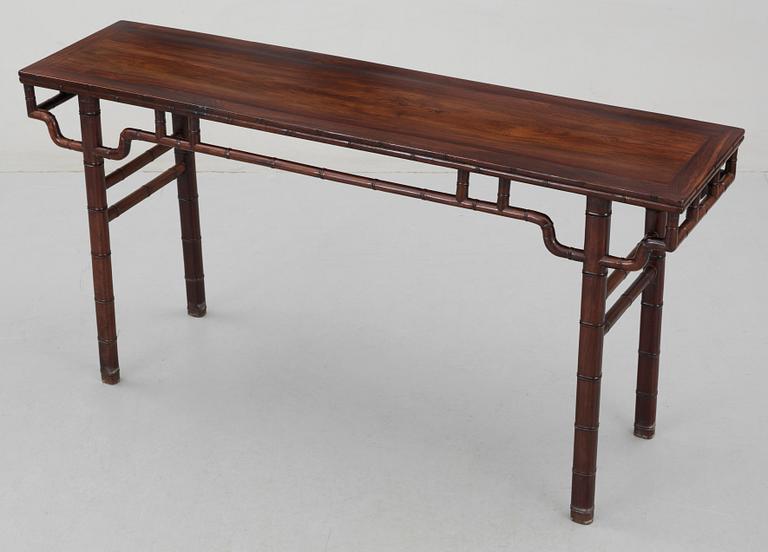 A hardwood free standing table, Qing dynasty.