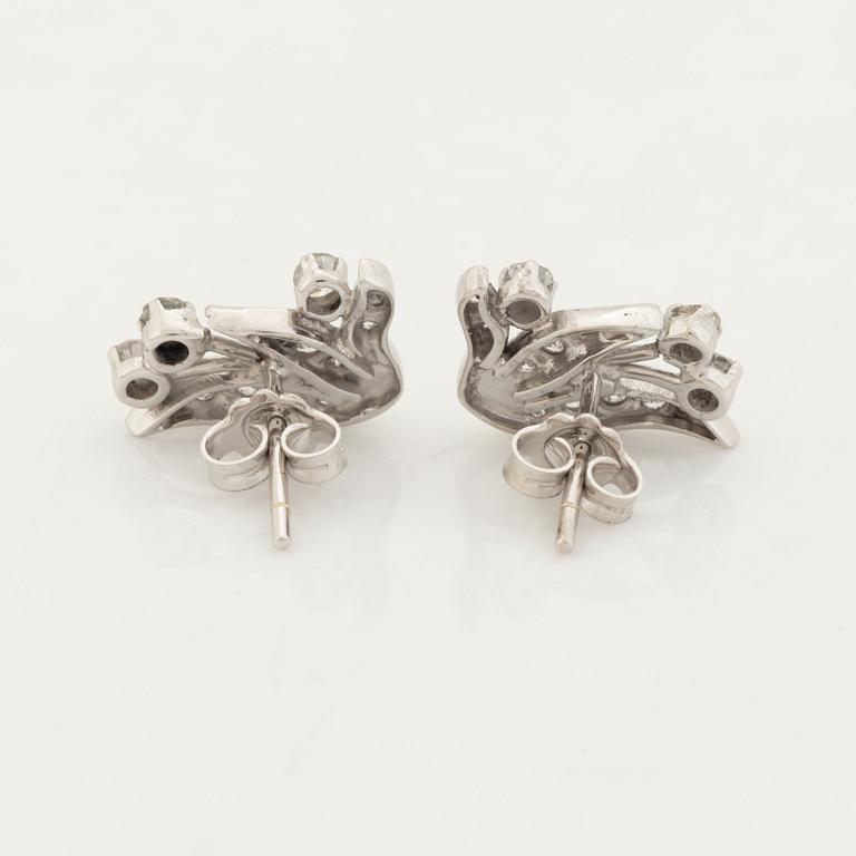 Diamond leaf earrings.