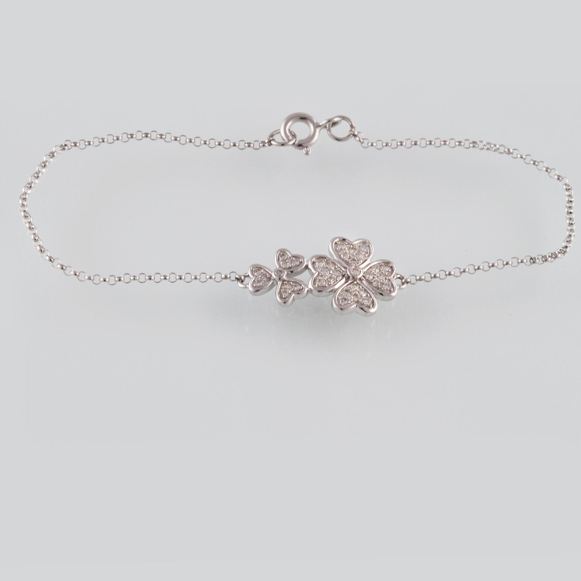 ARMBAND, 18K vitguld med briljantslipade diamanter ca 0.21 ct. Vikt 2,0 gram.