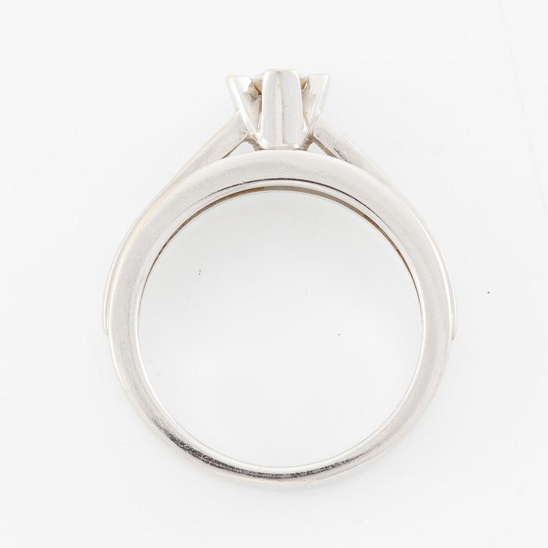 Ring in 18K white gold set with a brilliant-cut diamond, approximately 0.21 ct.