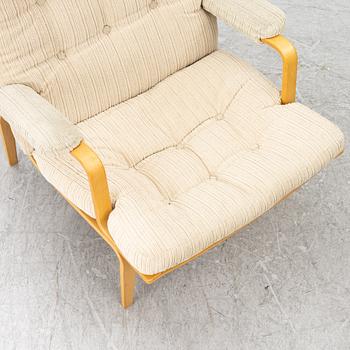 Bruno Mathsson, Armchair with footstool, “Ingrid”, Dux.