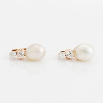 A pair of 18K gold and pearl earrings set with old-cut diamonds.