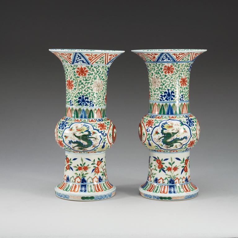 A pair of wucai vases, presumably 20th Century with Wanli six character mark.