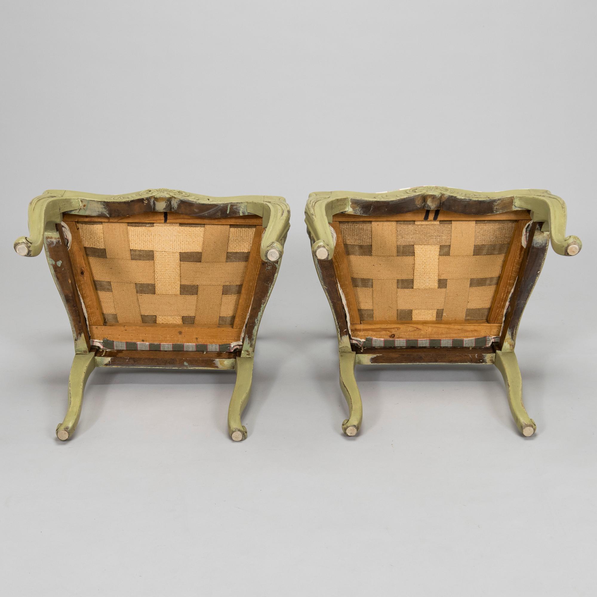 A pair of 20th century  Rococo style armchairs.