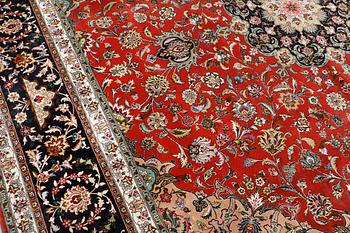 A Tabriz carpet, part silk, so-called 50 Raj, approx. 300 x 300 cm.