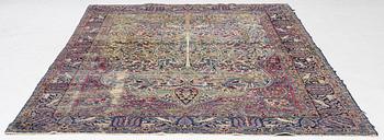A semi-antique Kerman carpet, c. 325 x 203 cm.