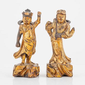 Two wooden figures of guardsmen, Qing dynasty, 19th Century.