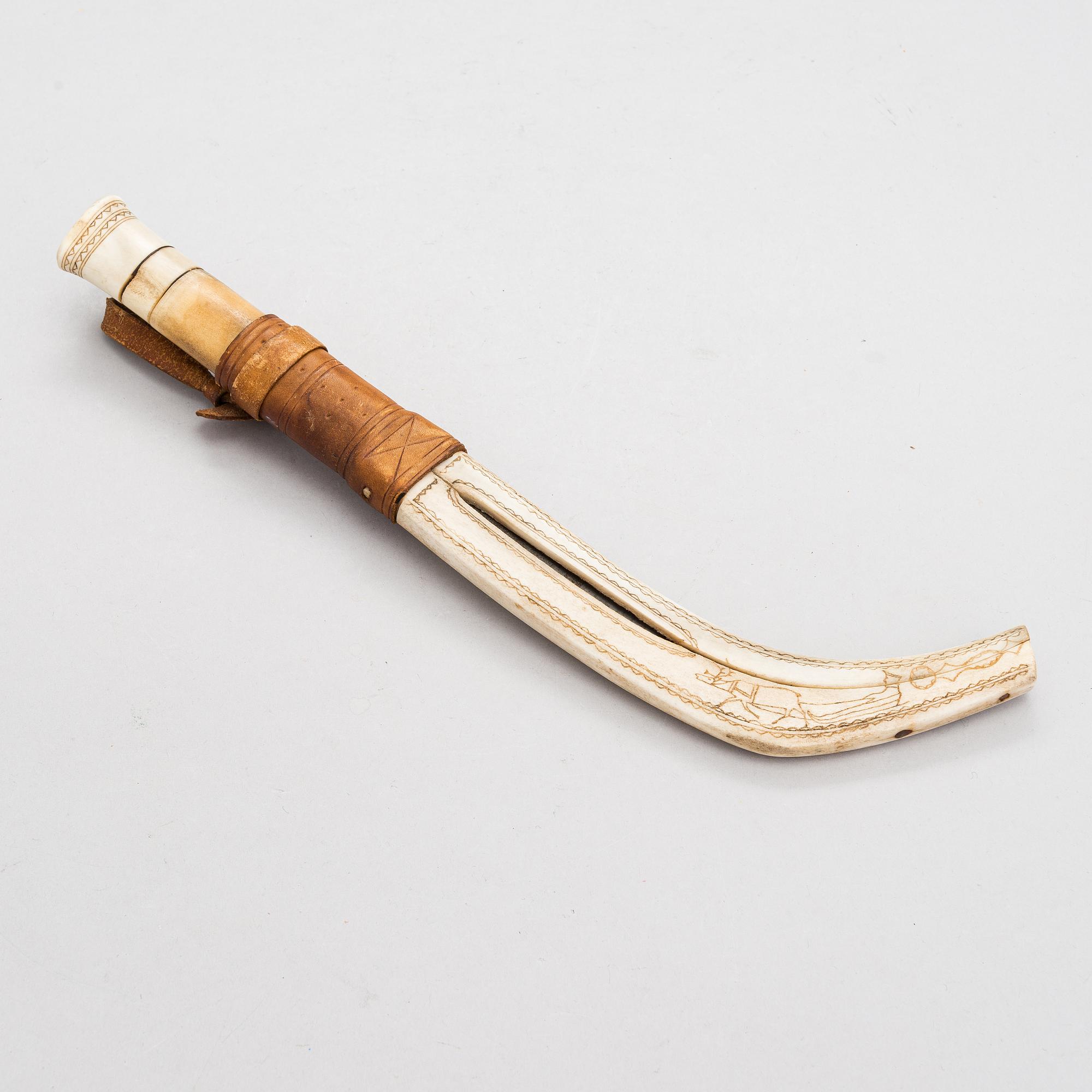A sami knife / sami handicraft / duodji large leuku knife from Lapland, early 20th century.