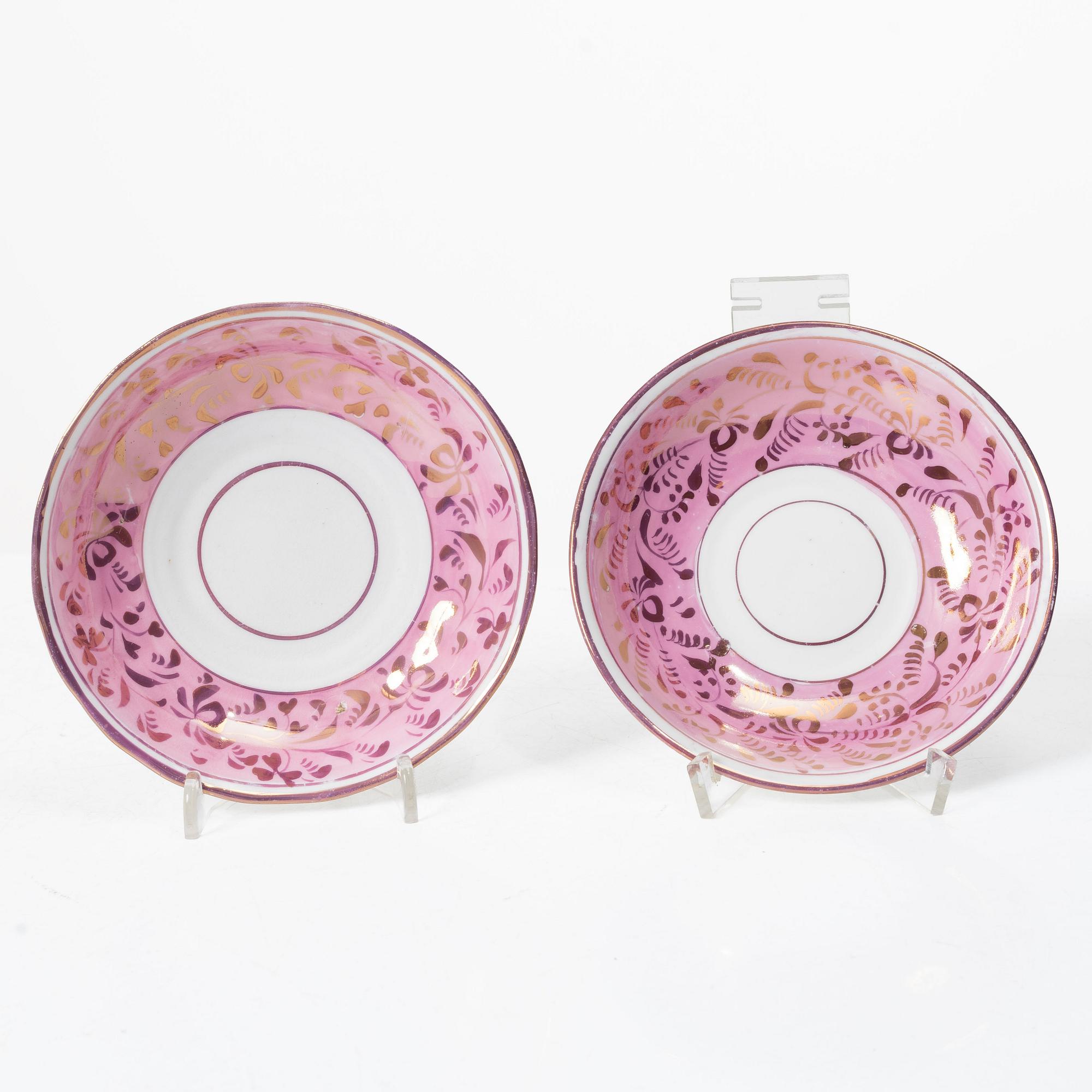 Twelve cups and saucers, England, 19th century.