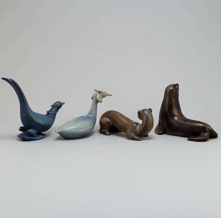 GUNNAR NYLUND, four stoneware figurines, from Rörstrand.