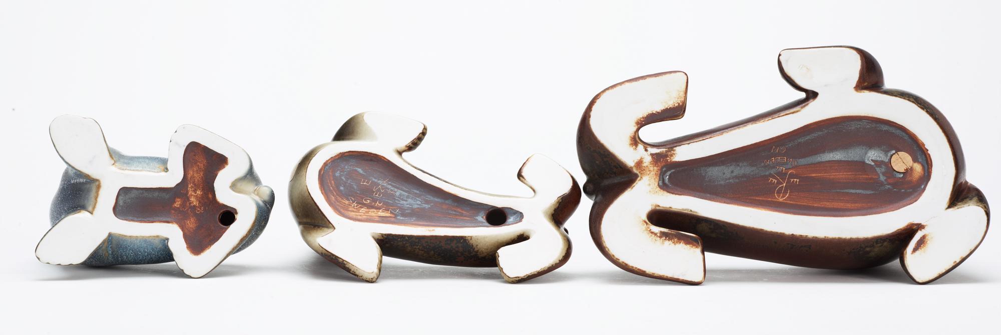 Three Gunnar Nylund stoneware figures, two seals and a walrus, Rörstrand.