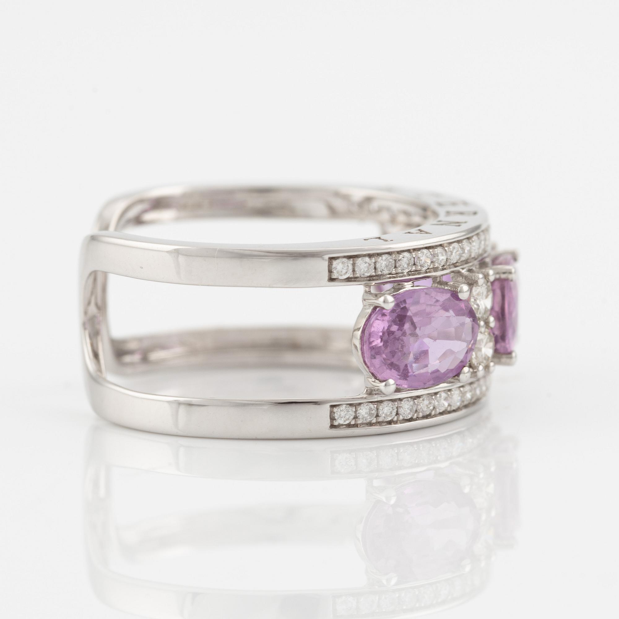 Ring with three pink sapphires and brilliant-cut diamonds.