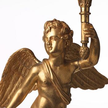 A pair of French Empire three-light candelabra, early 19th century.