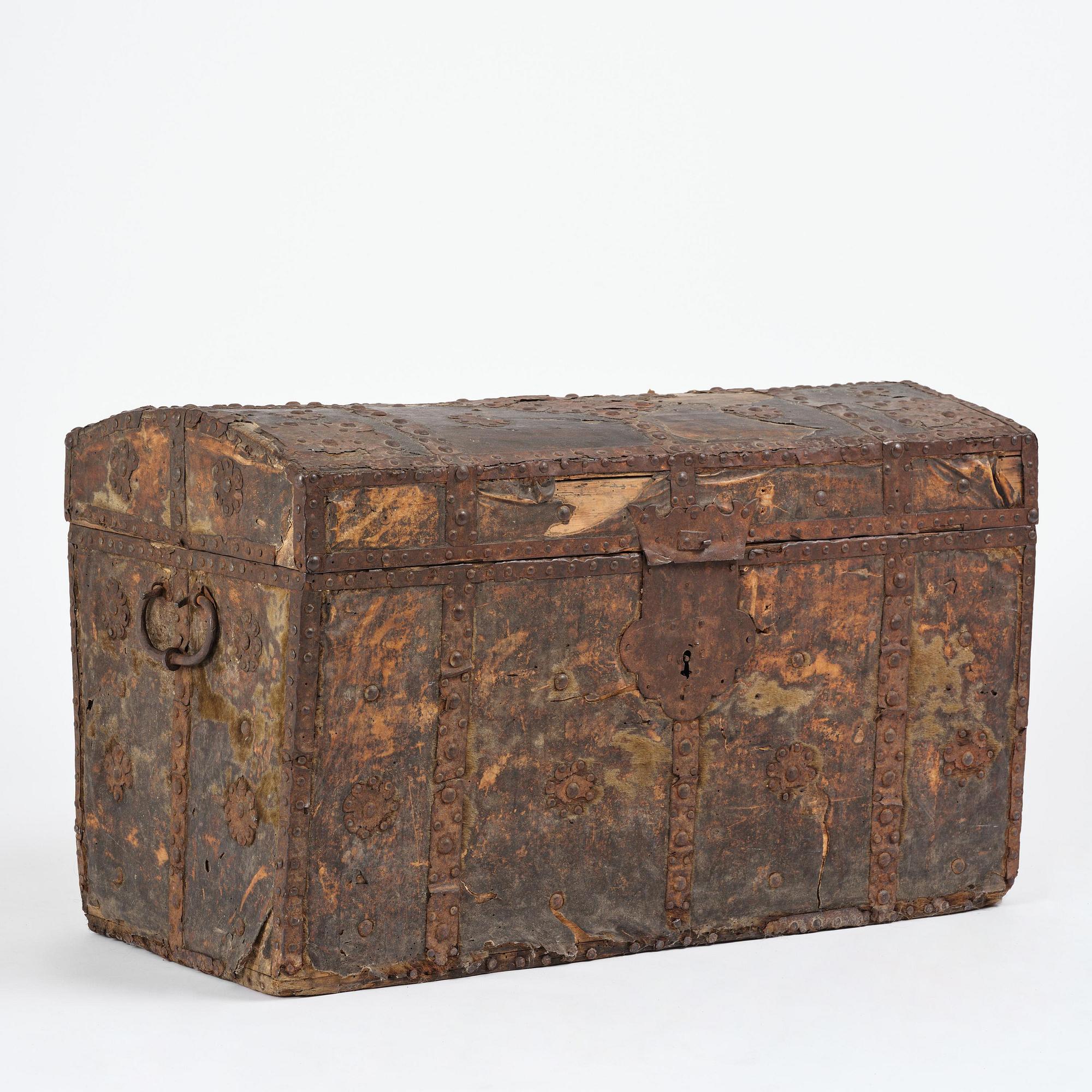 A Dutch baroque iron-bound and leather clad chest, later part 17th century.