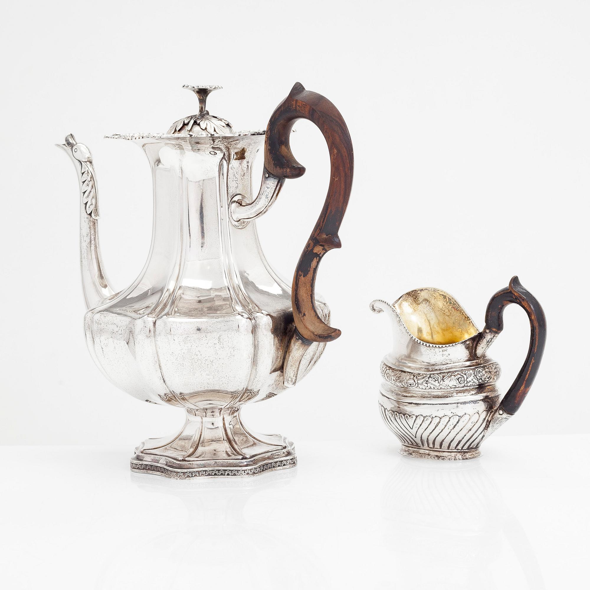 A silver coffee pot, and silver cream jug, Olof Robert Lundgren, Turku 1847 and Fredrik Strömsten, Helsinki 1839.