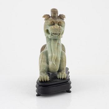 A green stone sculpture, China, 20th century.