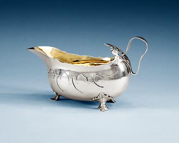 A SWEDISH PARCEL-GILT CREAM JUG, Makers mark of Lars Boye, Stockholm 1769.