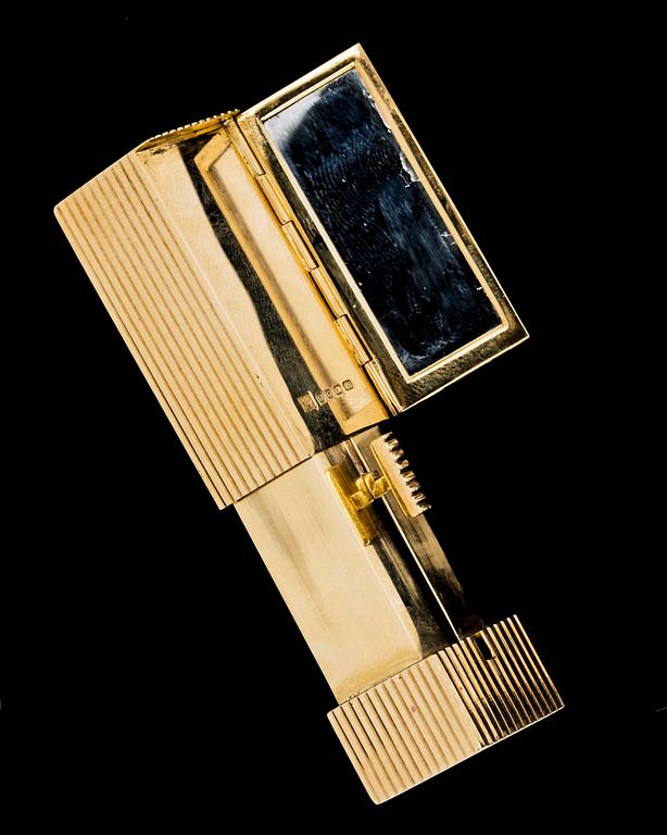 A 18k gold lipstick case.