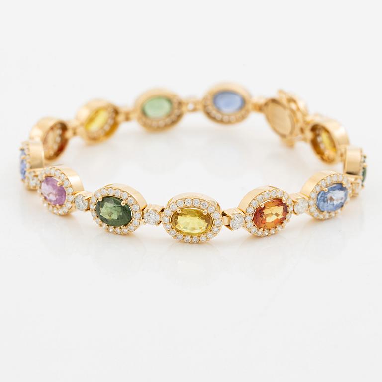 Bracelet 18K gold with oval multi-coloured sapphires and round brilliant-cut diamonds.