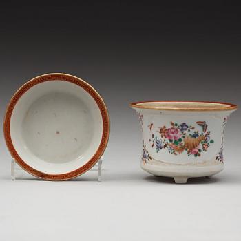 A famille rose flower pot with stand, Qing dynasty, Qianlong (1736-95).