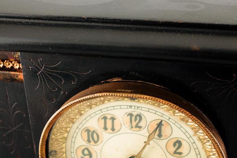 A 19th century table clock by New Haven Clock Co in New Haven, USA.