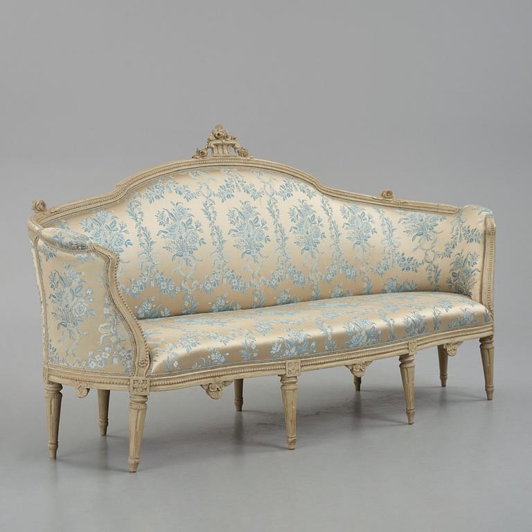 A grey-painted Gustavian 'canapé en corbeille'. sofa, by J E Höglander.