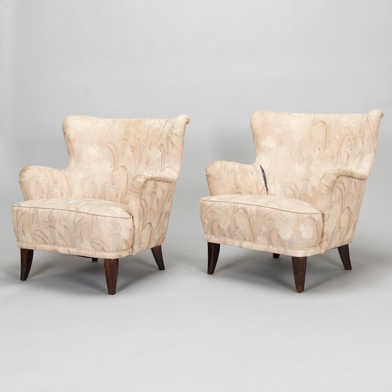 Ilmari Lappalainen, a pair of 1950's 'Laila' armchairs for Asko, Finland.