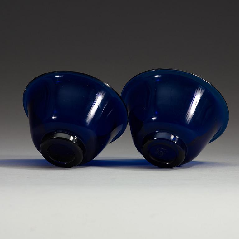 Two blue Peking glass bowls, late Qing dynasty.