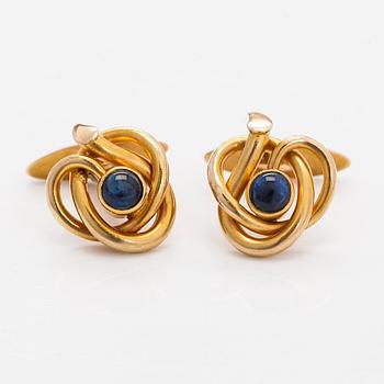 A pair of cufflinks, cabochon cut sapphires, 14K (56) gold, St Petersburg.