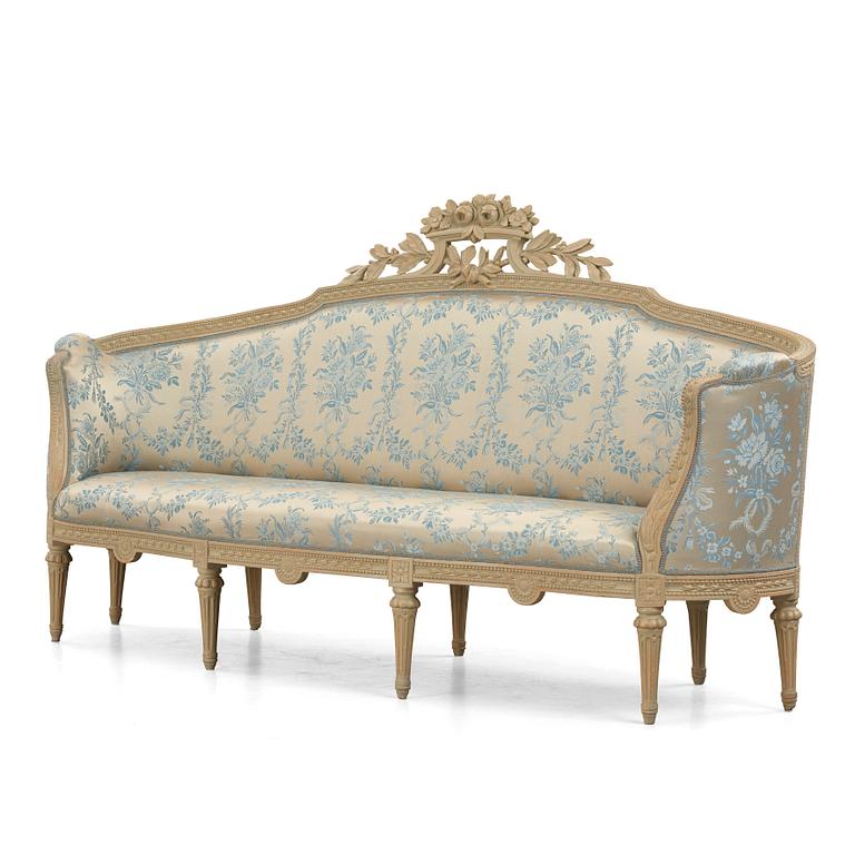 A grey-painted Gustavian 'canapé en corbeille'. sofa, later part of the 18th century.