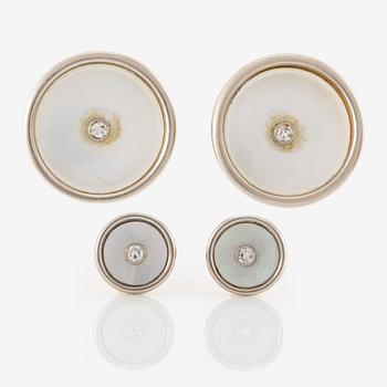 C.G Hallberg, cufflinks and shirt studs, two pairs, 18K gold with diamonds and mother-of-pearl.