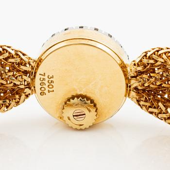 Piaget, armbandsur 18K guld och runda briljantslipade diamanter med länk av W.A. Bolin.