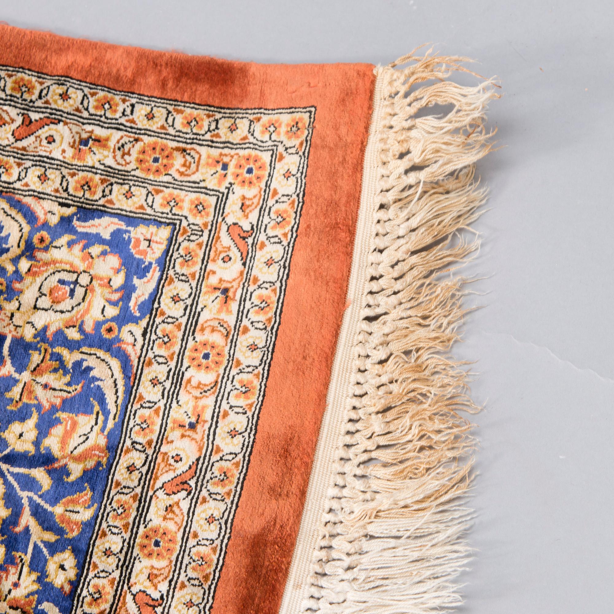 A SILK CARPET, Ghom, signed, 150x102 cm.