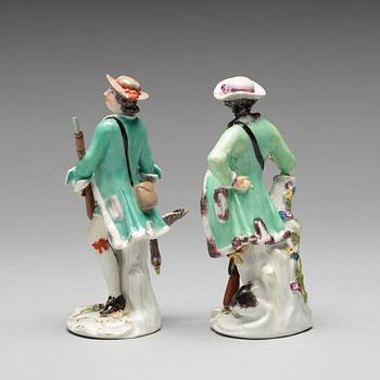 Two Meissen porcelain figures of huntsmen, 18th Century.