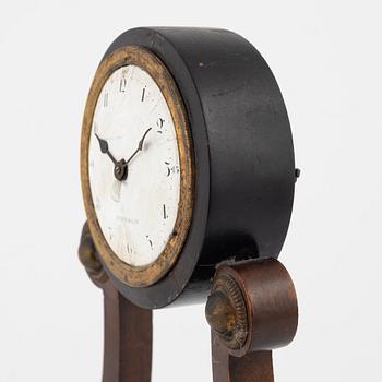 An Empire mantle clock from the 19th century.