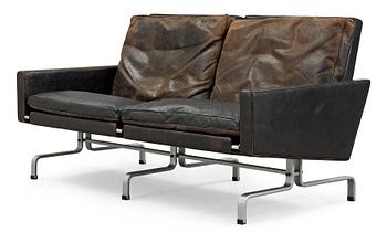 81. A Poul Kjaerholm 'PK-31-2' steel and black leather sofa,E Kold Christensen, Denmark.