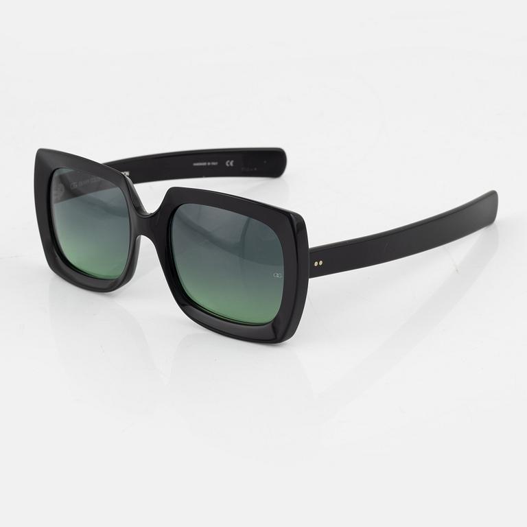Oliver Goldsmith, a pair of "Fuz" sunglasses.