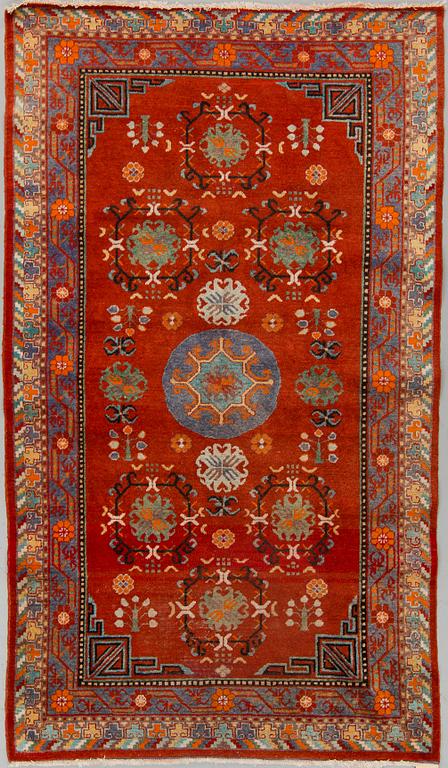 A russian or East Turkestan rug, around 224 x 130 cm.