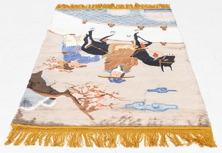 A rug, figural, silk, China, approx. 186 x 94 cm.