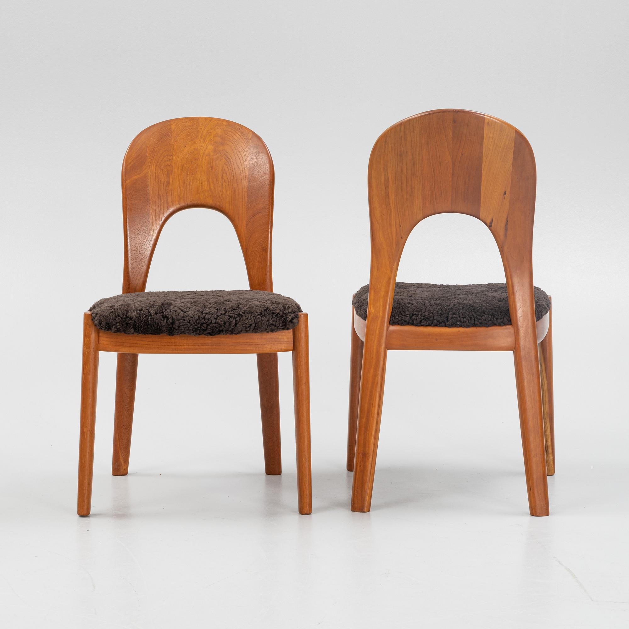 Niels Koefoed, eight teak dining chairs upholstered in new sheep skin, Denmark, 1960's.