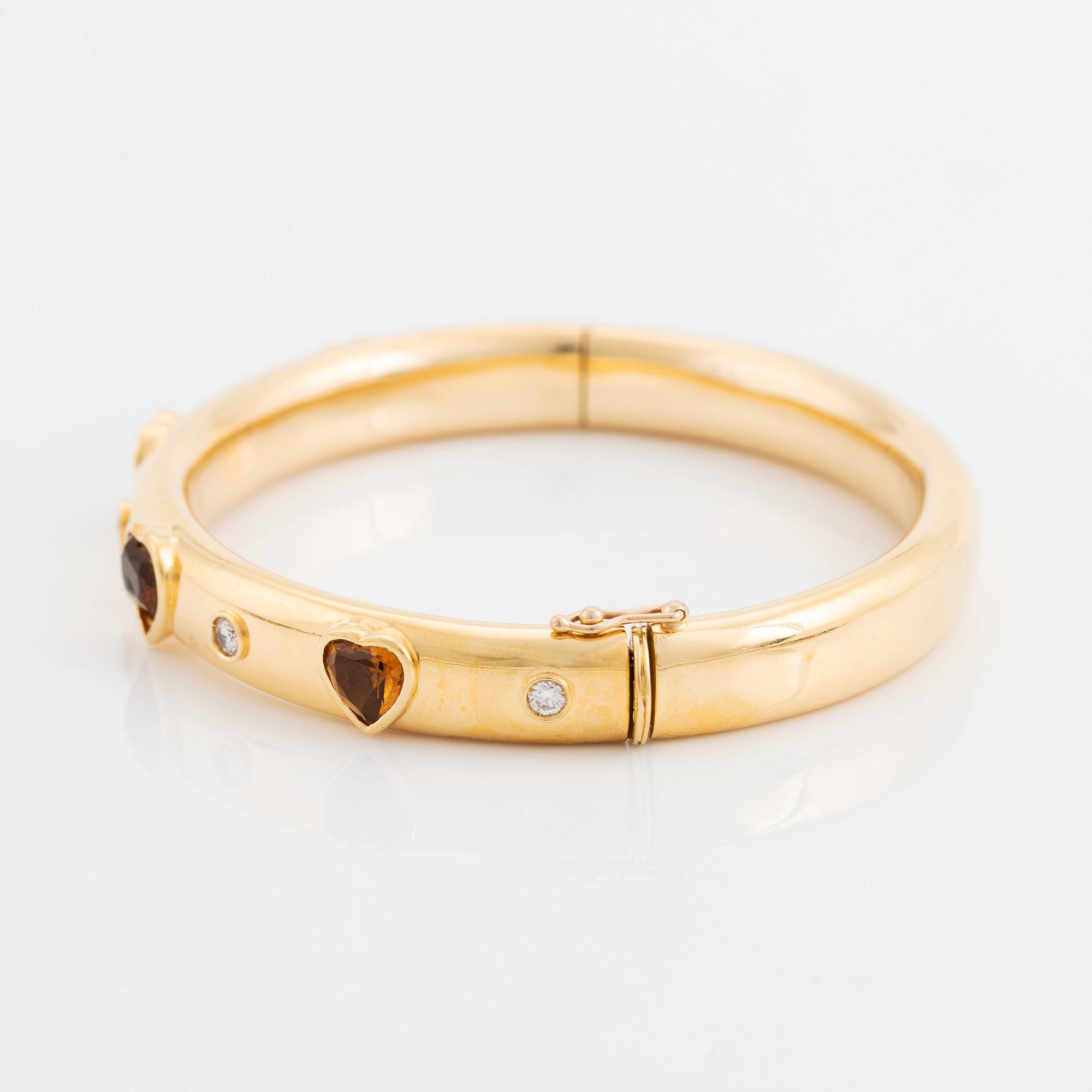 Armring 18K guld med hjärtformade citriner och runda briljantslipade diamanter, David Morris.