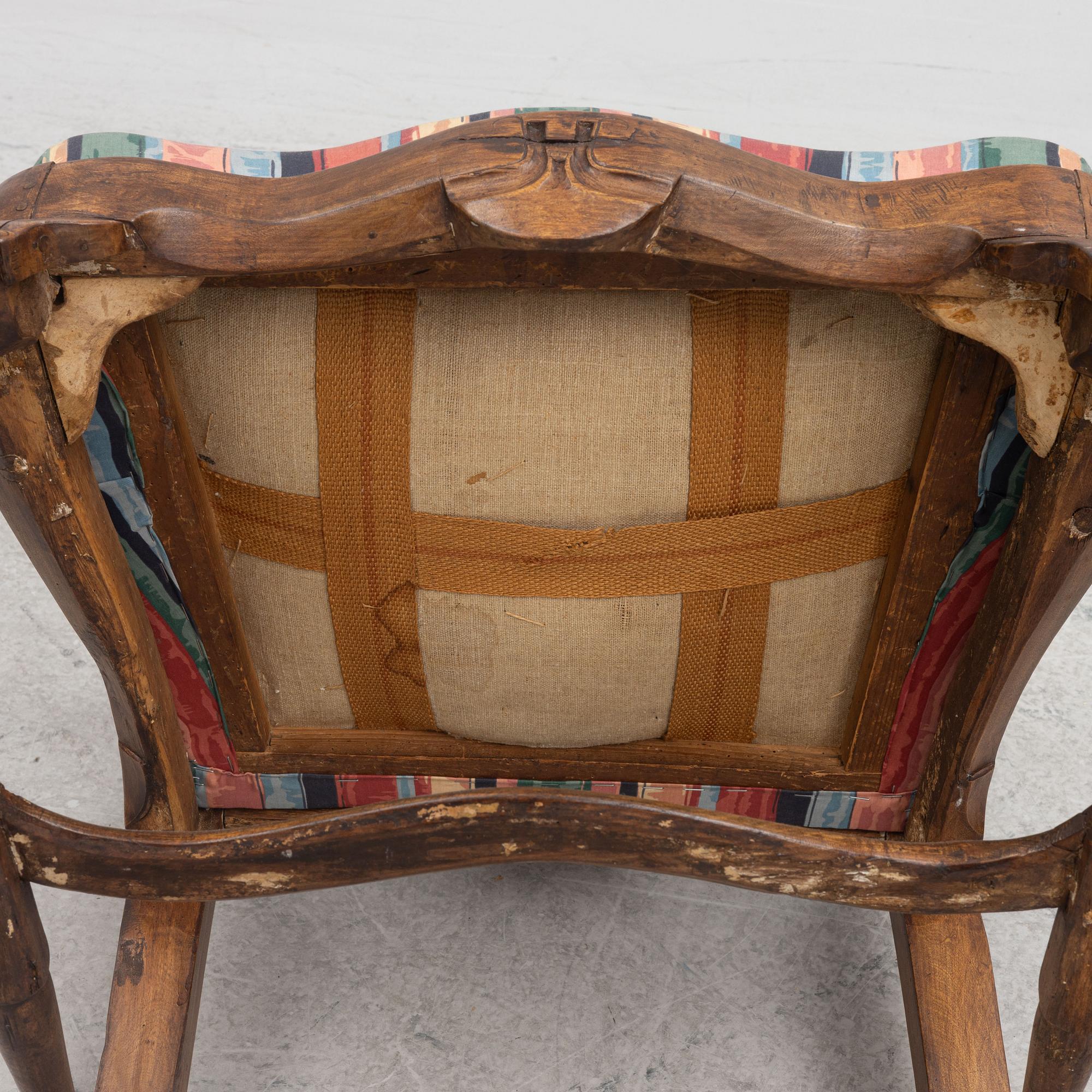 A roccoco armchair, 18th century.