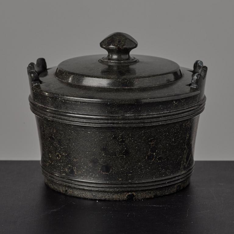 A serpentine stone butter box and cover circa 1800.