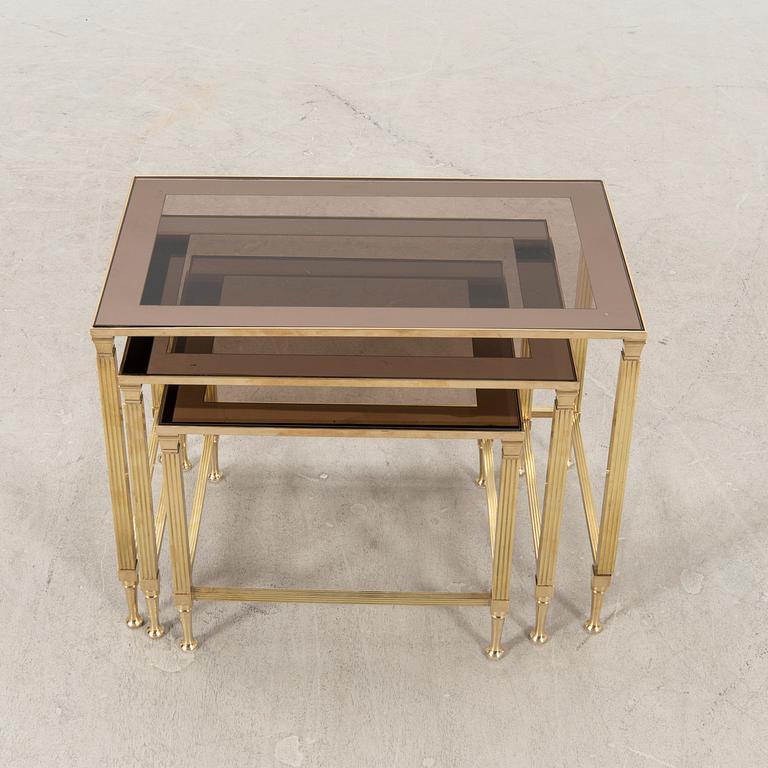 An Italian brass nesting table later part of the 20th century.